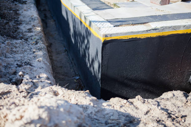 Professional Waterproofing technician working in Norcross, GA